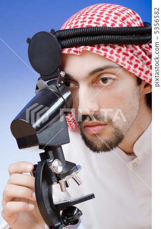 Arab chemist working in lab Arab chemist working in lab 5356582
