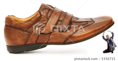 Woman domination concept with shoes and man 5356715