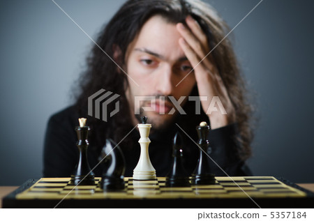 Chess player playing his game Chess player playing his game 5357184