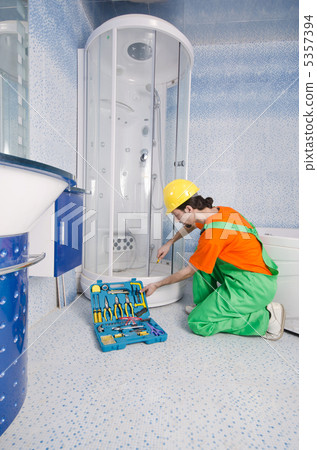 Plumber working in the bathroom Plumber working in the bathroom 5357394