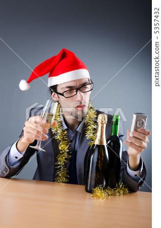 Drunken businessman after office christmas party Drunken businessman after office christmas party 5357432