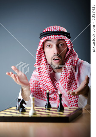 Chess player playing his game Chess player playing his game 5357433