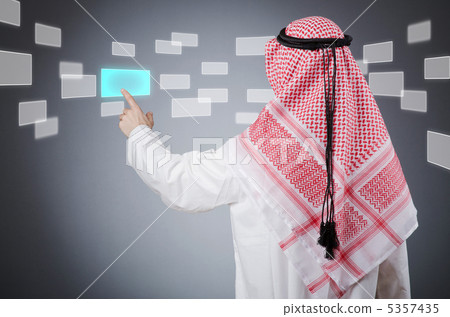 Young arab pressing virtual buttons Young arab pressing virtual buttons 5357435