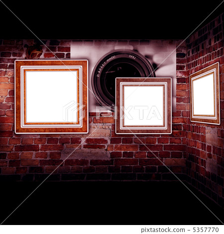 Art gallery. Frames old leather on a brickwall. 5357770