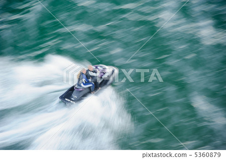 Riding on jet ski Riding on jet ski 5360879