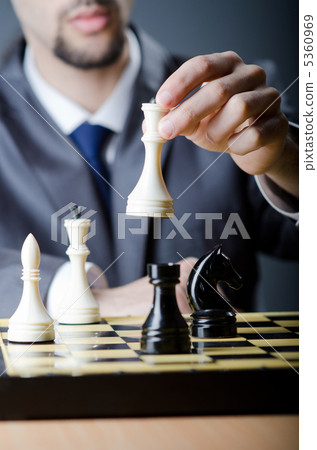 Chess player playing his game Chess player playing his game 5360969
