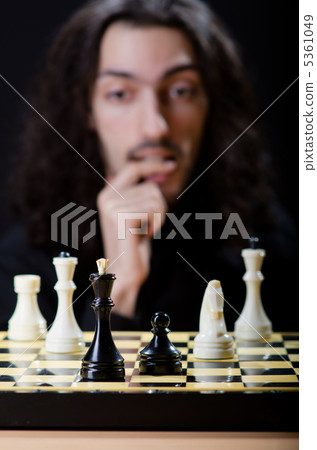 Chess player playing his game 5361049
