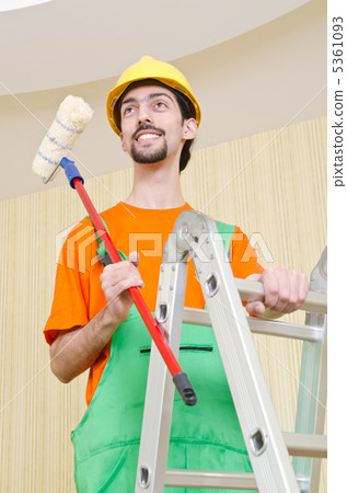 Painter worker during painting job Painter worker during painting job 5361093