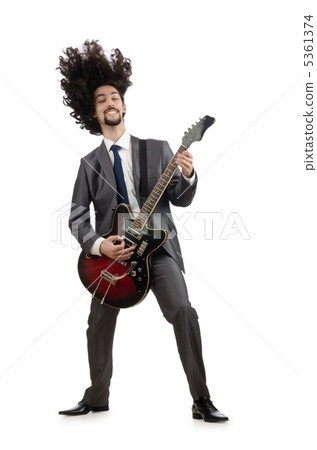 Guitar player in business suit on white Guitar player in business suit on white 5361374