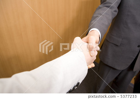 Handmade two businessmen shaking hands 5377233