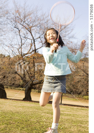 Elementary school students playing badminton 5379086