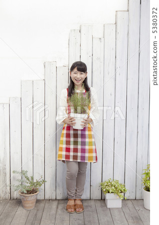 Potted plants and women Potted plants and women 5380372