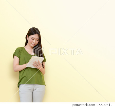 A woman taking a note 5390810