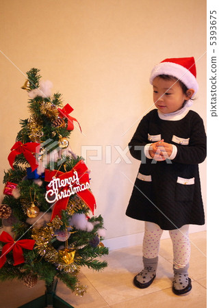 Christmas tree and girl 5393675
