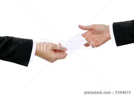 Two hands exchanging a business card 5394672
