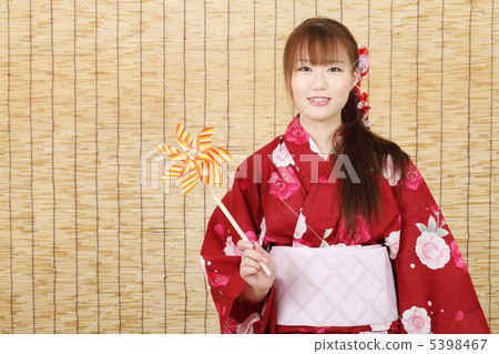 A woman in a yukata A woman in a yukata 5398467
