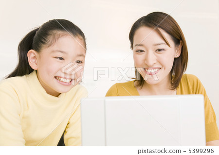 Women and girls watching the monitor Women and girls watching the monitor 5399296