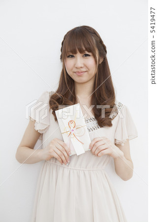 Girls holding a gift bag Girls holding a gift bag 5419477