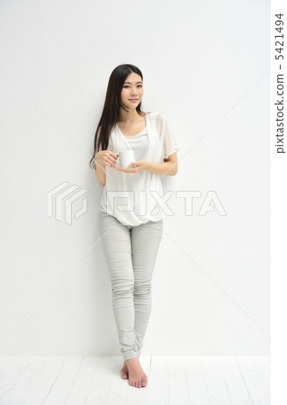 A young lady with a drink 5421494