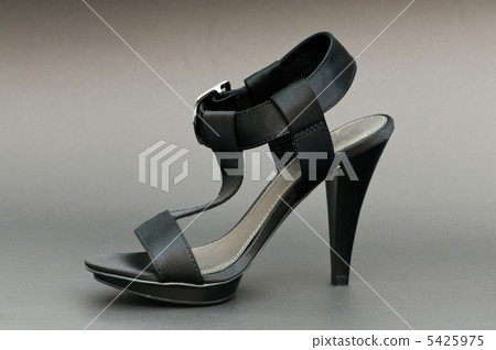 Fashion concept with open toe woman shoes Fashion concept with open toe woman shoes 5425975