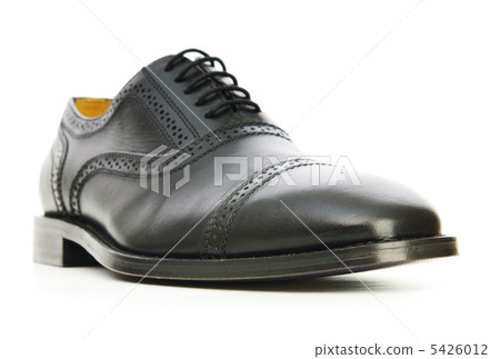 Male shoes isolated on the white background Male shoes isolated on the white background 5426012