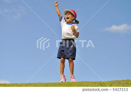 Girls posing in a blue sky (gym clothes, red and white hat) Girls posing in a blue sky (gym clothes, red and white hat) 5427213