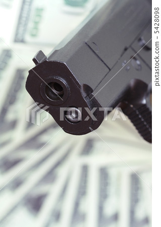 Gun and money 5428098