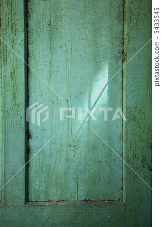 Light shining on the old door 5433545