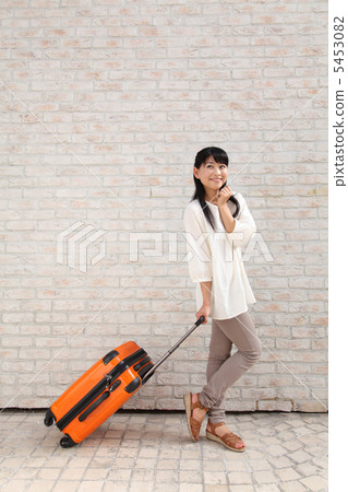 A woman holding a carry cart A woman holding a carry cart 5453082