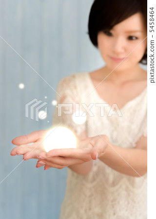 Women's hand with light Women's hand with light 5458464