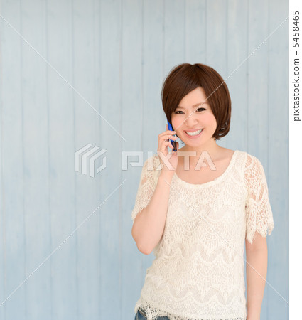 Woman speaking on the phone Woman speaking on the phone 5458465