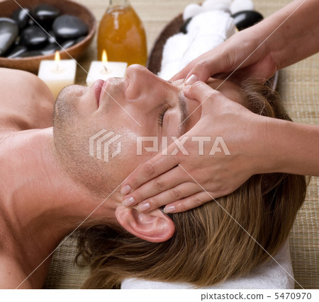 Spa. Young Man Getting Face Massage 5470970