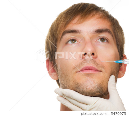 Man gets cosmetic injection of botox .Beauty Treatment Man gets cosmetic injection of botox .Beauty Treatment 5470975