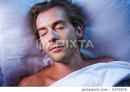Young Man Sleeping In His Bed Young Man Sleeping In His Bed 5470976