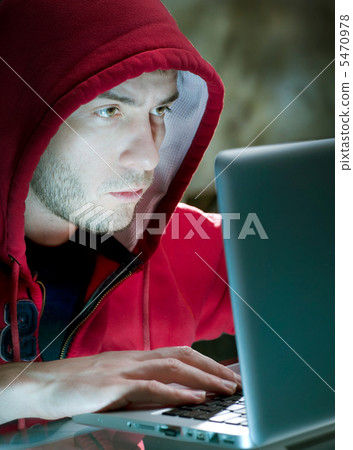 Hacker. Man With Computer In A Dark Room Hacker. Man With Computer In A Dark Room 5470978