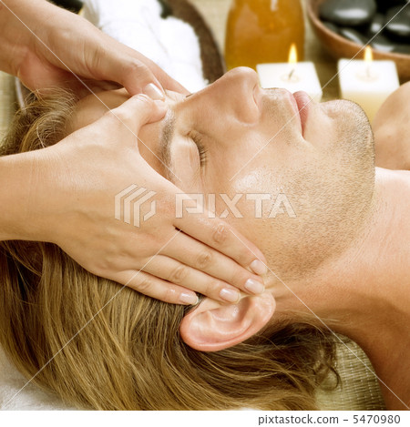 Spa. Young Man Getting Face Massage 5470980