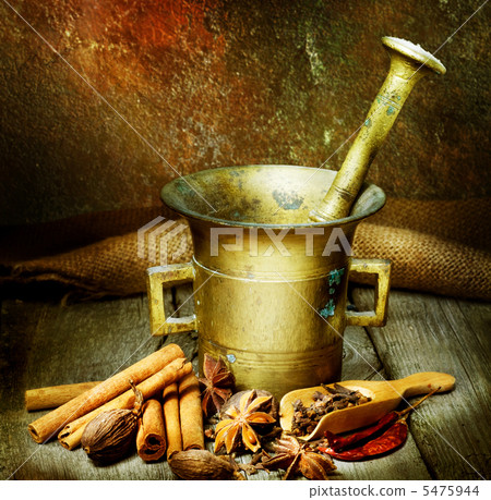 Spices And Antique Mortar With Pestle 5475944