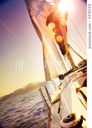 Yacht Sailing against sunset.Sailboat.Sepia toned 5476559