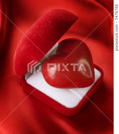 Valentine concept. Red velvet Gift Box with a heart Valentine concept. Red velvet Gift Box with a heart 5476788
