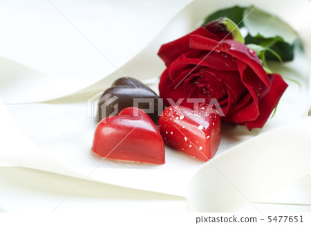 Valentine card. Chocolate hearts and red rose Valentine card. Chocolate hearts and red rose 5477651