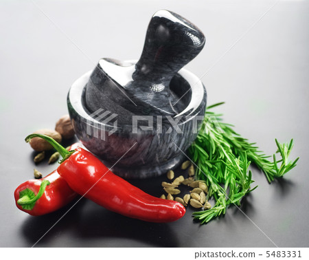 Mortar With Pestle And Herbs. Over Black Background Mortar With Pestle And Herbs. Over Black Background 5483331