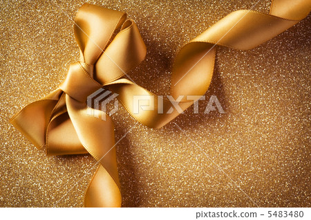 Holiday Background.Greeting Card.Gold Bow on a Blinking Backgrou 5483480