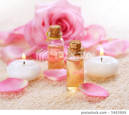 Bottles of Essential Oil for Aromatherapy. Rose Spa Bottles of Essential Oil for Aromatherapy. Rose Spa 5483909