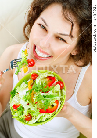 Diet. Healthy Young Woman Eating Vegetable Salad 5484029