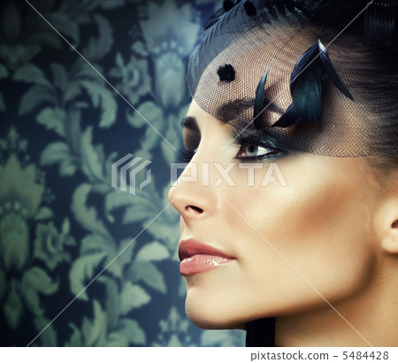 Retro portrait of Beautiful Young Woman. Vintage Styled 5484428