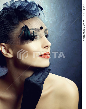 Retro Styled Beautiful Young Woman portrait. Vintage 5484445