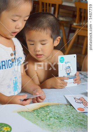 Children enjoying picture books 5487759
