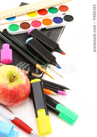 School supplies and apples. School supplies and apples. 5488385