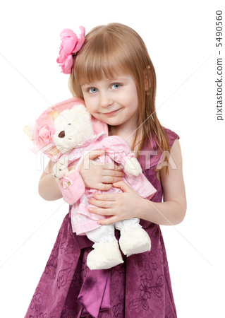 portrait of a little girl 4 years old with a plush toy 5490560