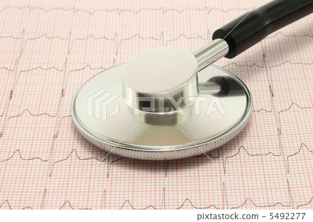 Phonendoscope on a cardiogram 5492277
